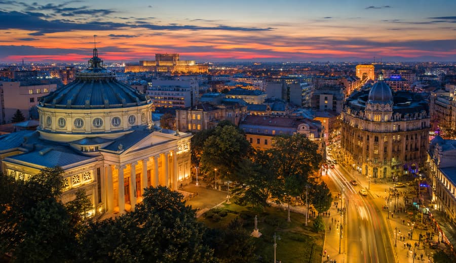Bucharest at dusk — the Romanian Athenaeum and Calea Victoriei